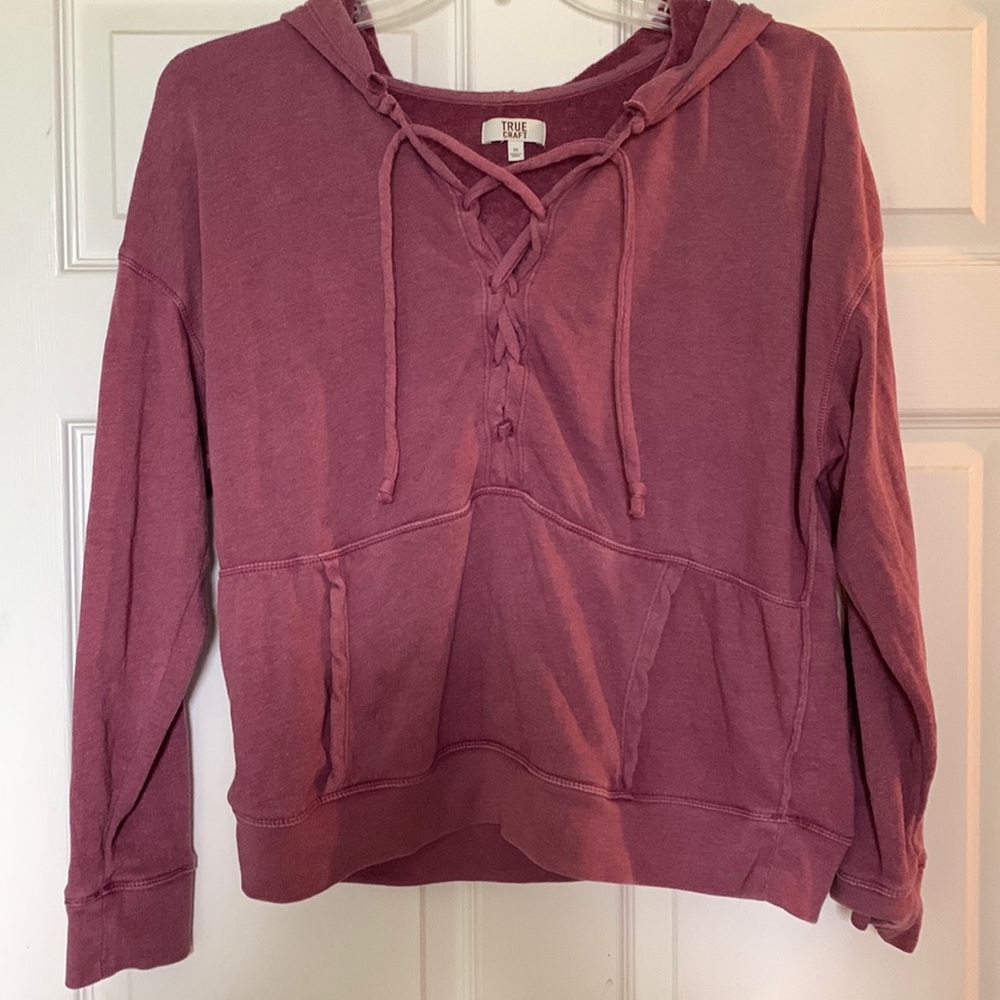 True craft, pink cropped hoodie. Brand new. Never worn. Drawstring and pockets.